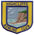 The design of the badge represents a 'high cliff'. The mixed club opened in 1975, having been built by Christchurch Council in Nea Meadows, a Local Nature Reserve. The running of the club was taken over by the membership in 2008.